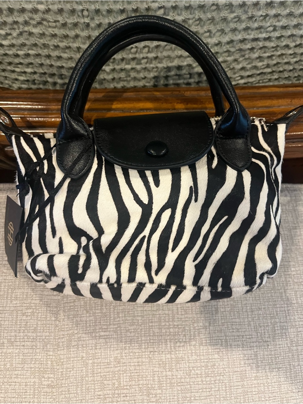 NWT mini bag in black and white zebra print. Genuine calf hair